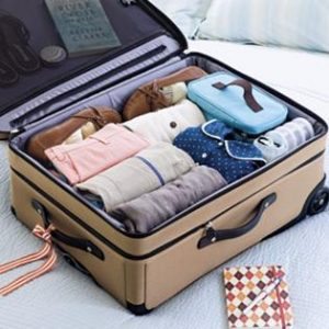 rolled-clothes-pack-tight-and-fit-snugly-into-any-size-or-shape-luggage