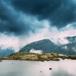 Scenic View Of Mountains Lake. Nature Of The Norwegian Mountains