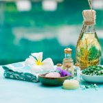Spa and Wellness Massage Setting. Still Life with Essential Oil, Salt and Stones.