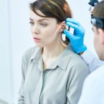 Audiologist Examining Hearing