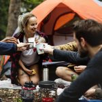 Friends camping in the forest together