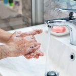 Man is washing hands with soap. Coronavirus pandemic. Covid-19