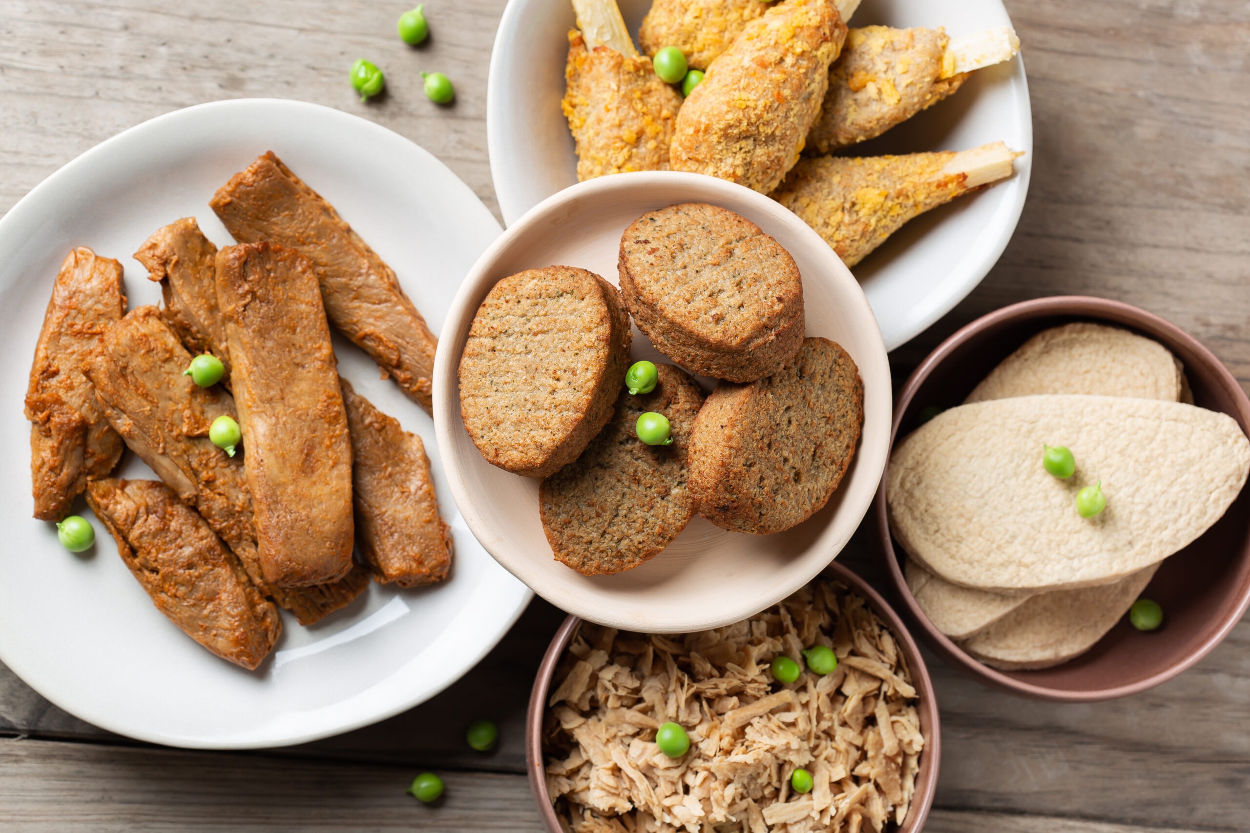 Variety of plant based meat, food to reduce carbon footprint seitan dishes