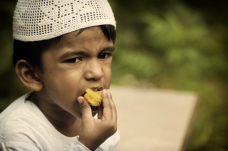 boy eating during ramadan