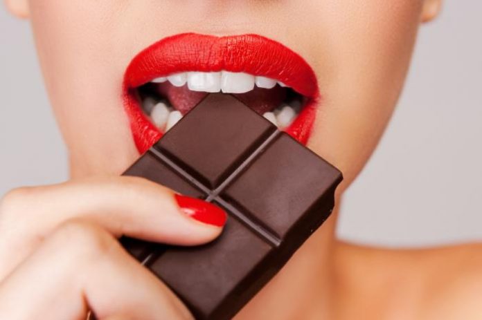 woman eating chocolate