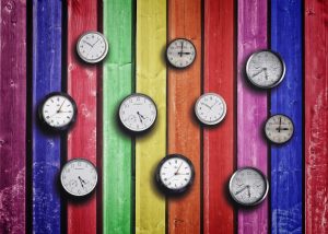 stockvault clocks on colorful wood background time concept178062