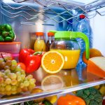 Open refrigerator filled with food