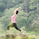 young beautiful asian woman practicing yoga