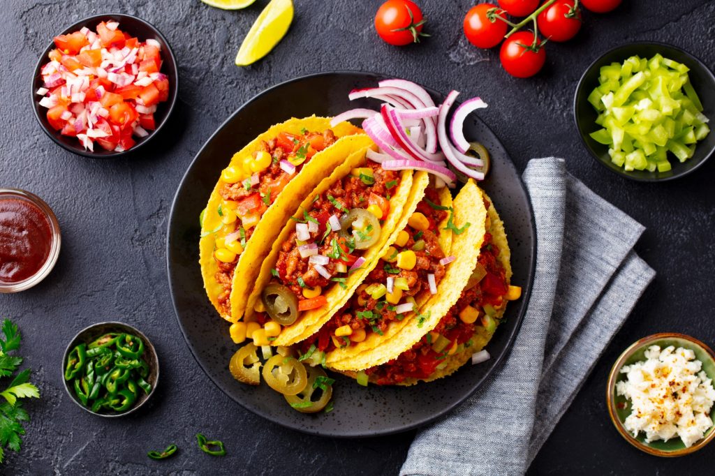 Taco with Beef. Mexican Traditional Cuisine. Dark Background. Top View.