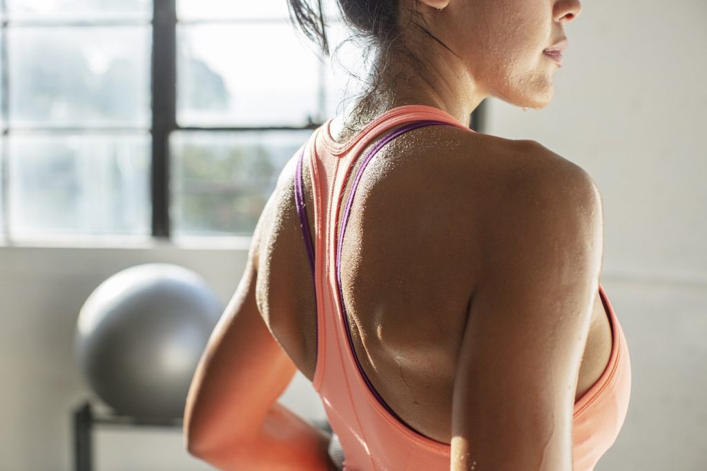 sweaty exercise, dripping down skin woman