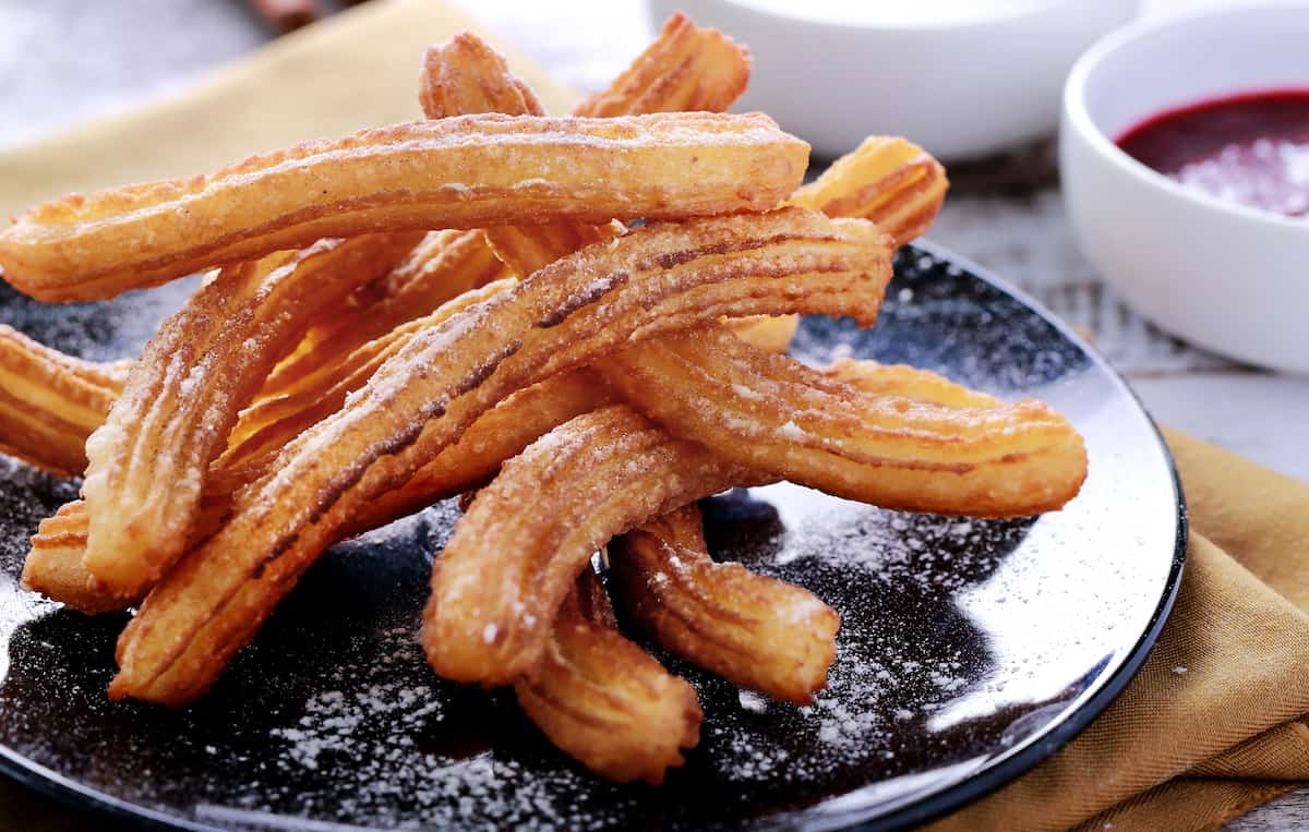 Easy Eggless Churros Recipe With Chocolate Sauce Crunchy Yet Tender.