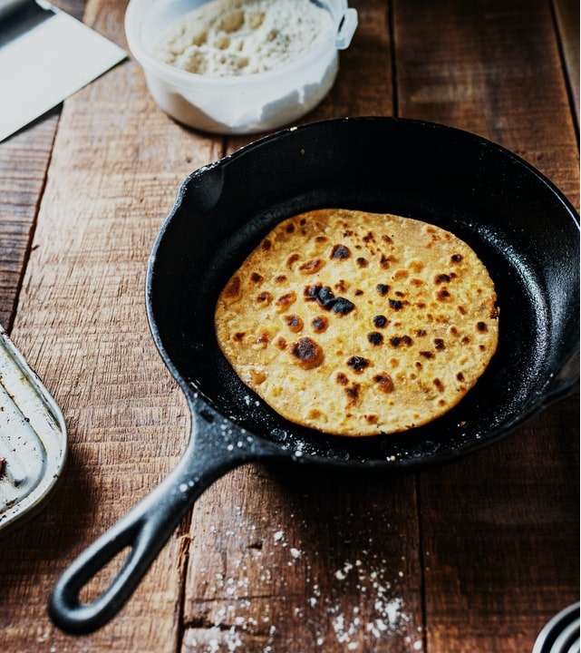 Egg-cooked roti on Tawa