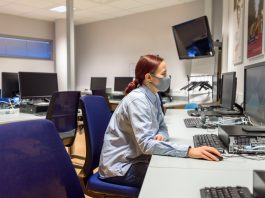 Woman student in computer class