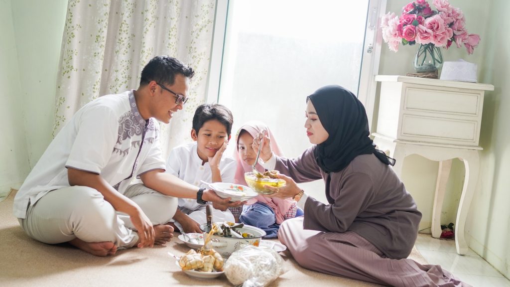 The family tradition of Eid al-Fitr is to eat ketupat opor or side dishes