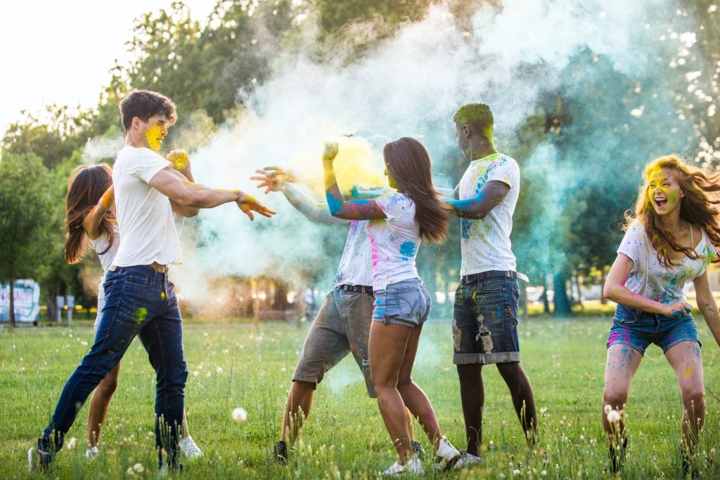 Friends playing with holi powder