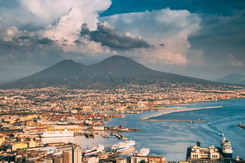 Naples, Italy. Top View Cityscape Skyline Of Naples With Mount Vesuvius And Gulf Of Naples In