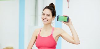 Smiling Woman Presenting Weightloss App