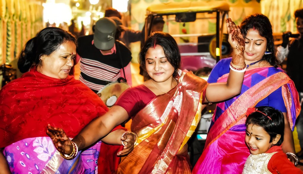 Indian women dance at an Indian wedding ..