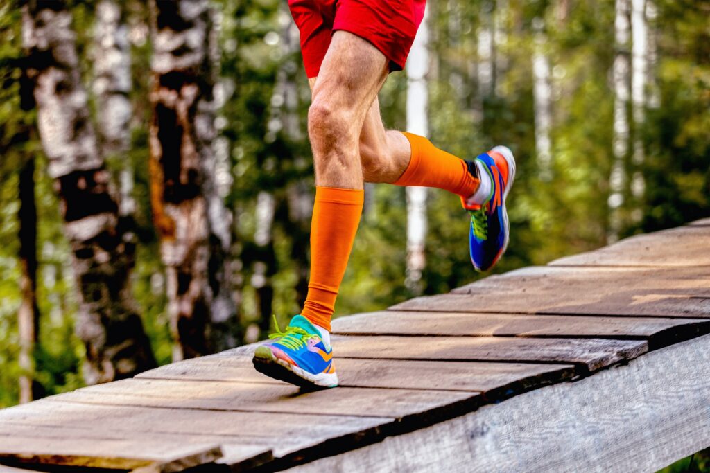 legs man runner in compression socks