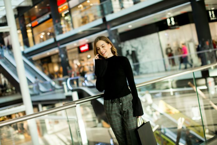 Young woman shopping in mall