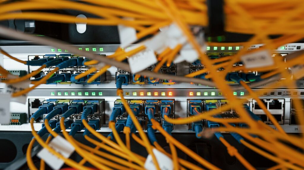 Close up view of internet equipment and cables in the server room