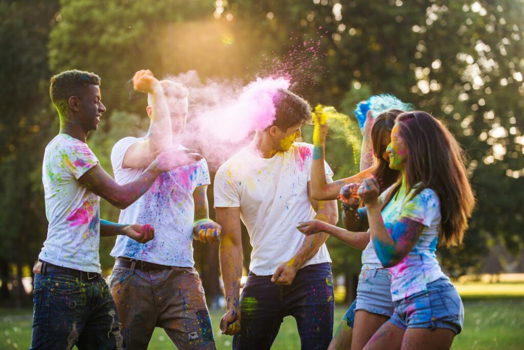 Friends playing with holi powder