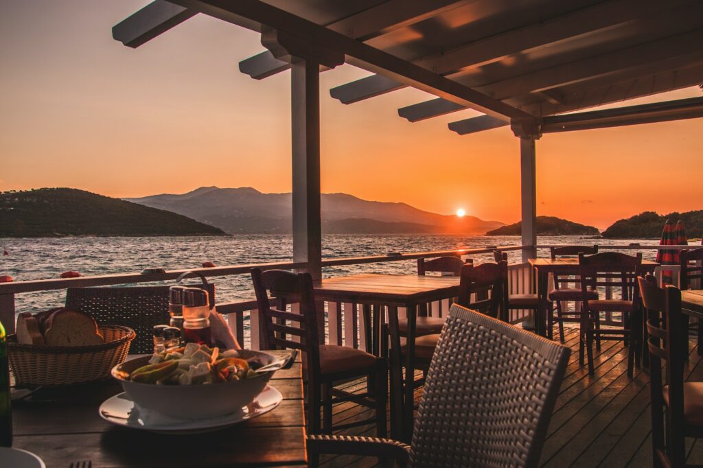 Empty coastal cafe overlooking the scenic ocean during a golden hour