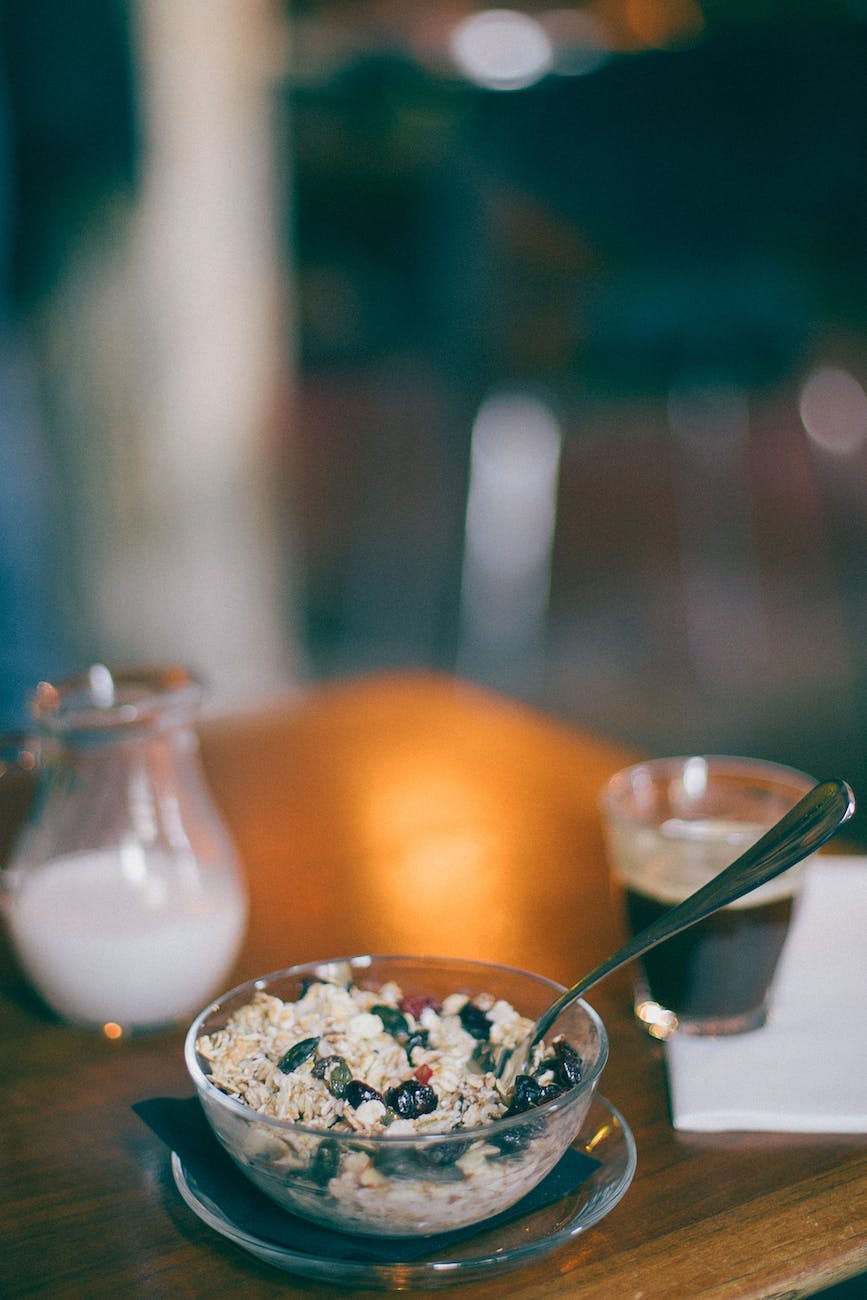 oat with grapes near coffee for breakfast