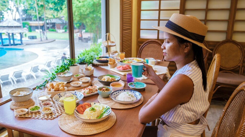 Asian Thai women having Luxury breakfast in hotel