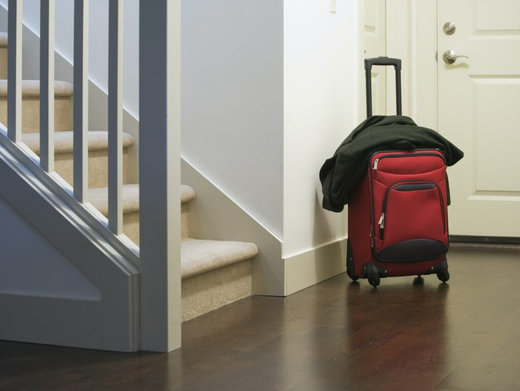 Rolling Luggage at the Front Door