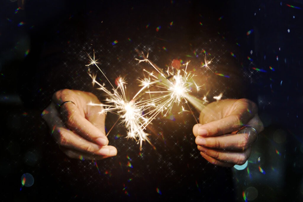 Man celebrating diwali with sparklers