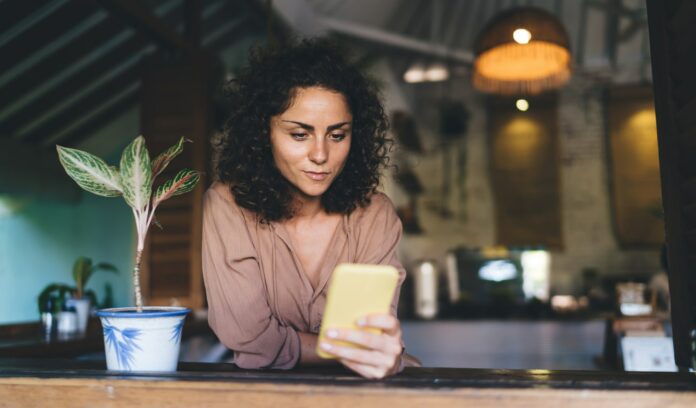 Woman making Telegram marketing strategy