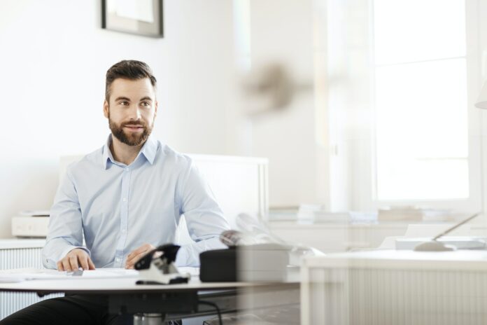 Man sitting at desk in office