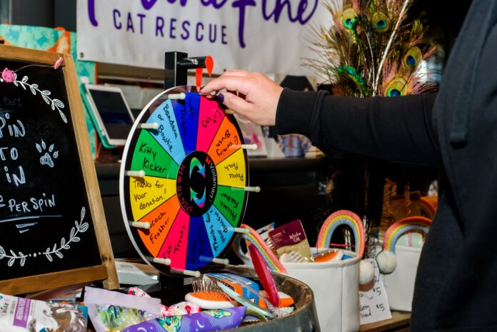 Close-up of a spinning game wheel in motion with a vibrant colorful scheme