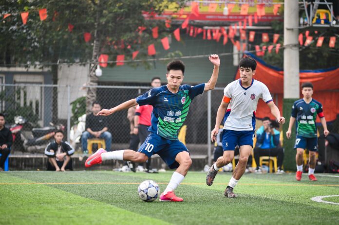 Legendary football player in action during a professional match, showcasing the skill and passion that define the greatest football players in history.